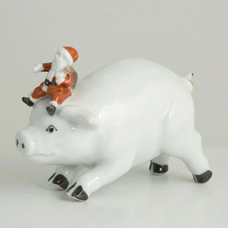 Pig with Santa Claus. porcelain. Barbara Flügel