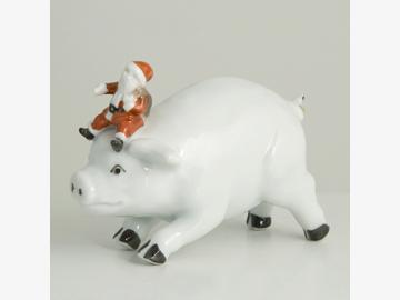 Pig with Santa Claus. porcelain. Barbara Flügel